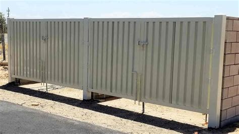 metal bar bolted to ground trash enclosures|trash enclosures for pickups.